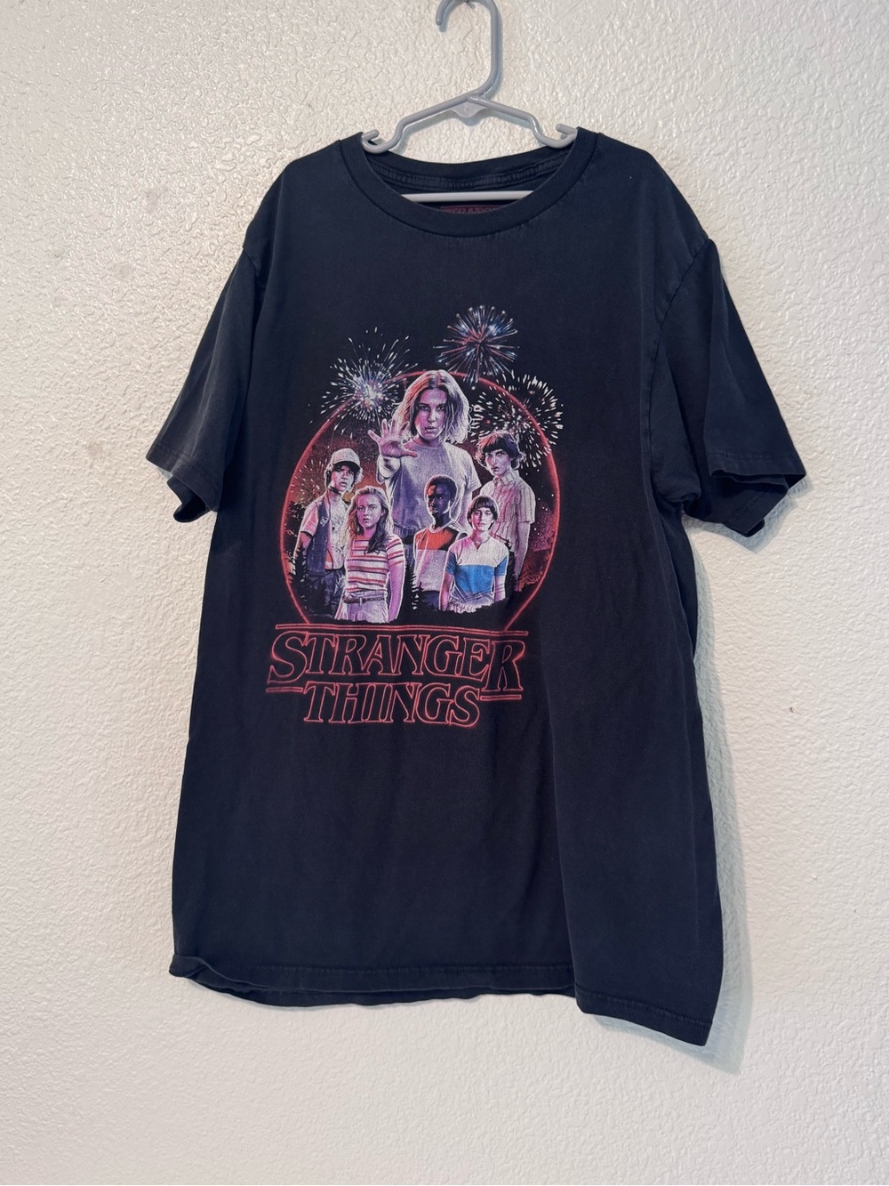 Netflix Stranger Things Black Graphic Tee with Multicolor Cast Art
